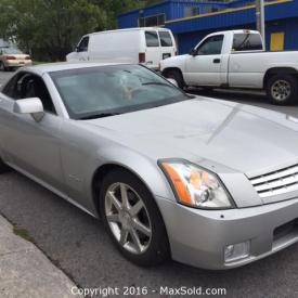 MaxSold Auction: This online auction features 2004 Cadillac XLR, Lawn-Boy Lawn Mower, Vanity, Pendulum Clock, Textured Print, Original Oil On Board, Piano And Bench, GE Washing Machine, GE Dryer and much more.